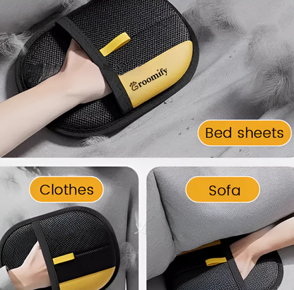 Groomify™ glove cleaning pet hair from bed sheets, clothing, and sofa cushions